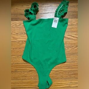 New with tags kelly green body suit w ruffle